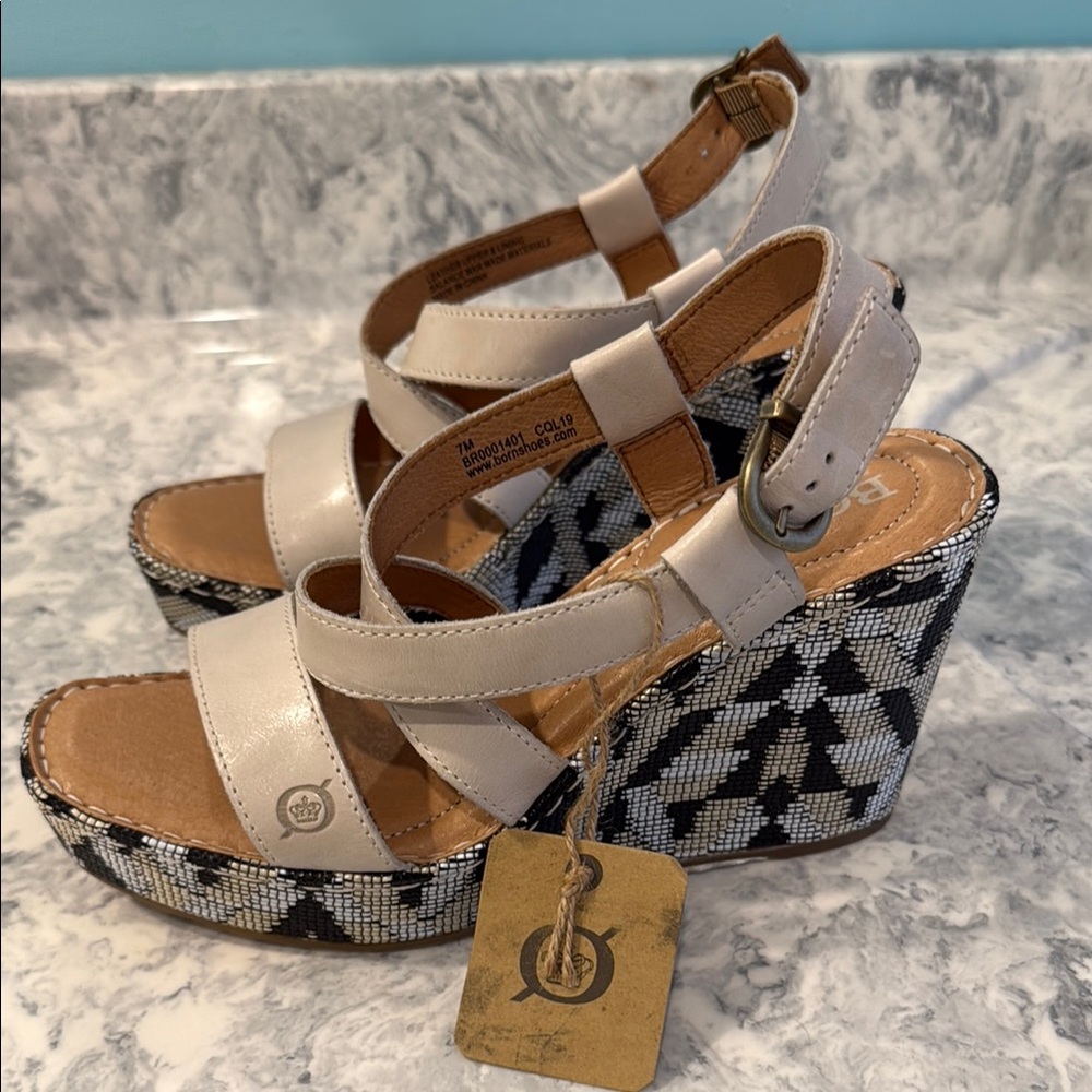Born wedge sandals with cream and black stitching